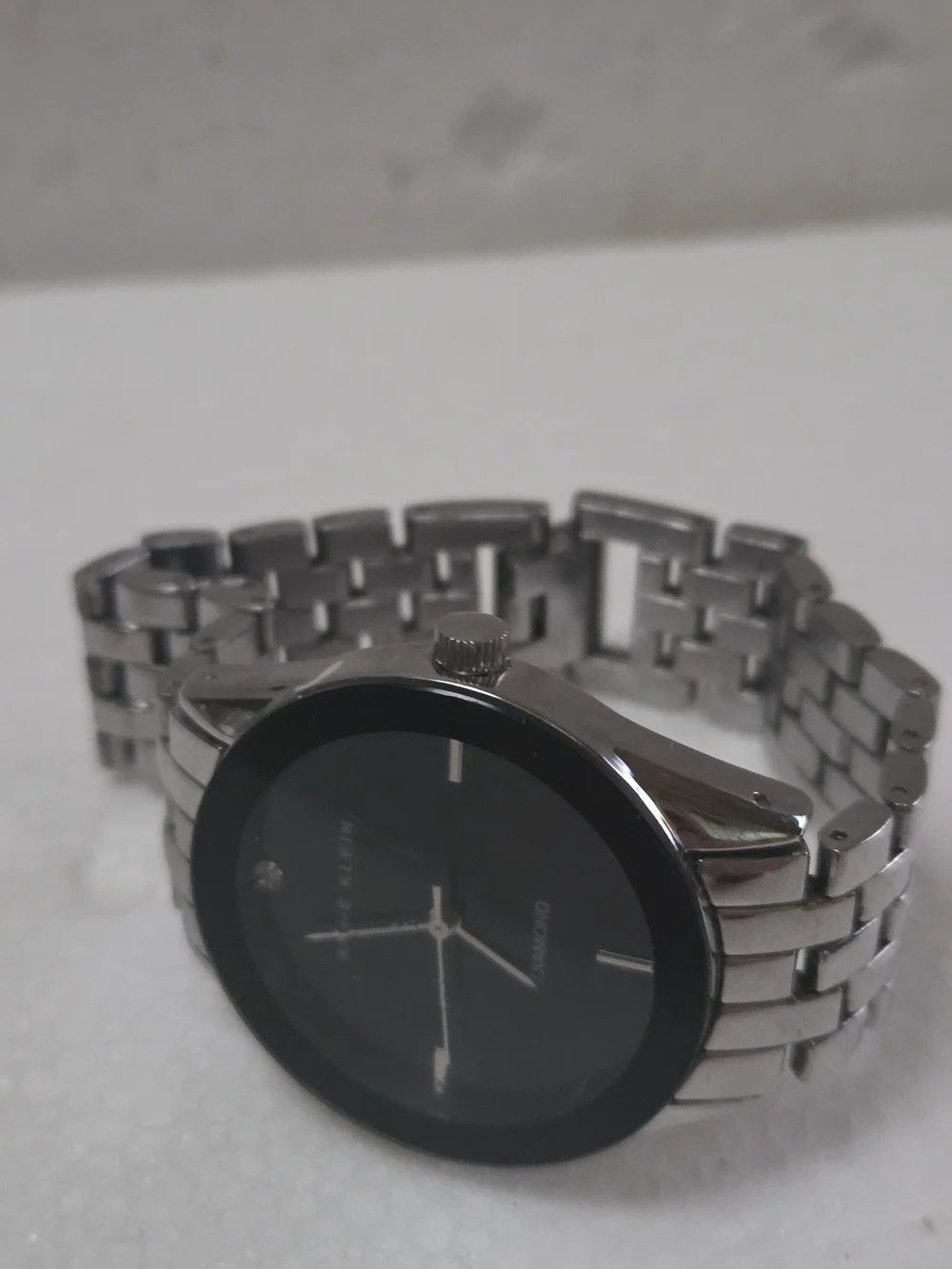 Anne Klein Silver Bracelet Watch with Black Dial And Diamond Accent